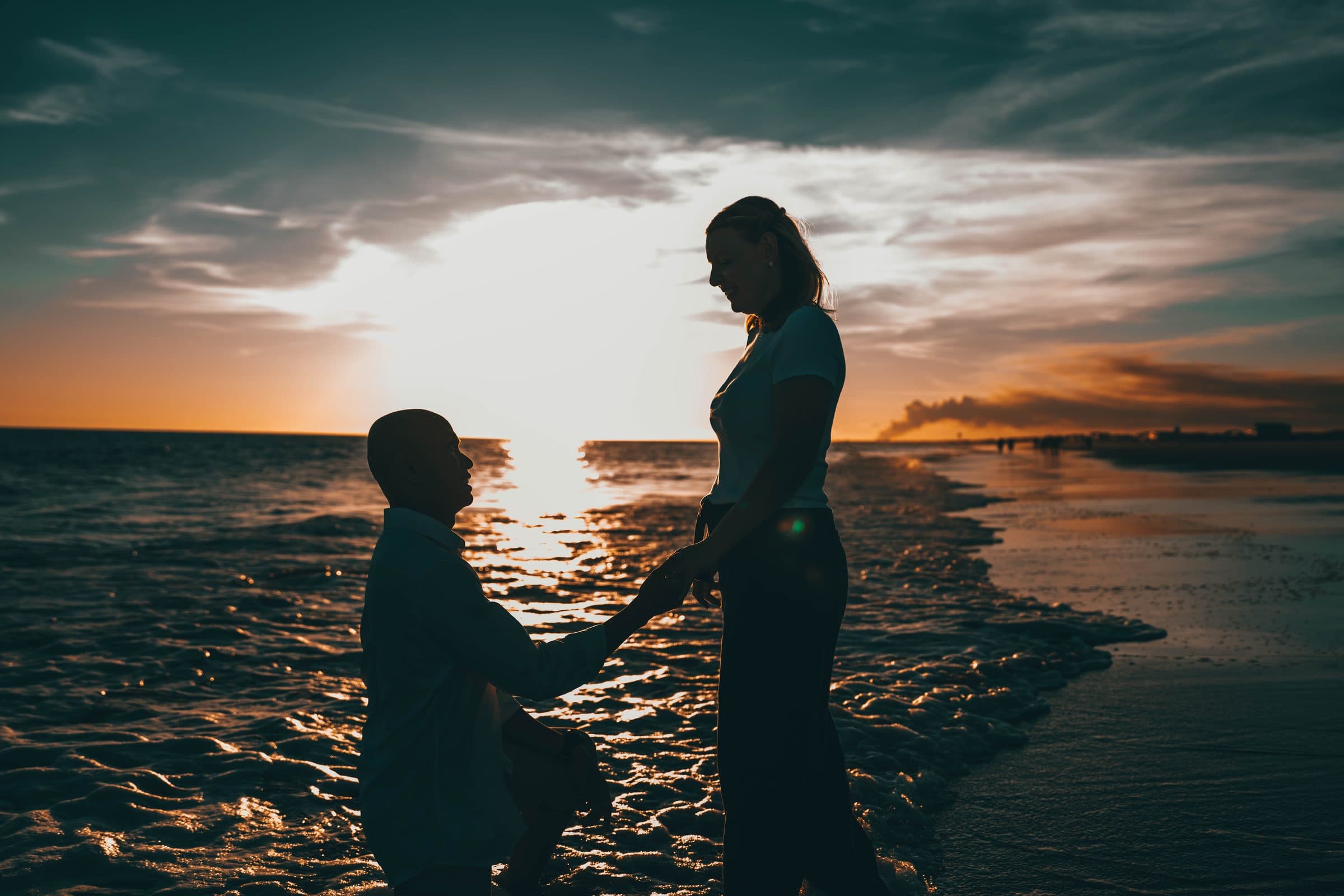 Silhouette of a proposal at sunset